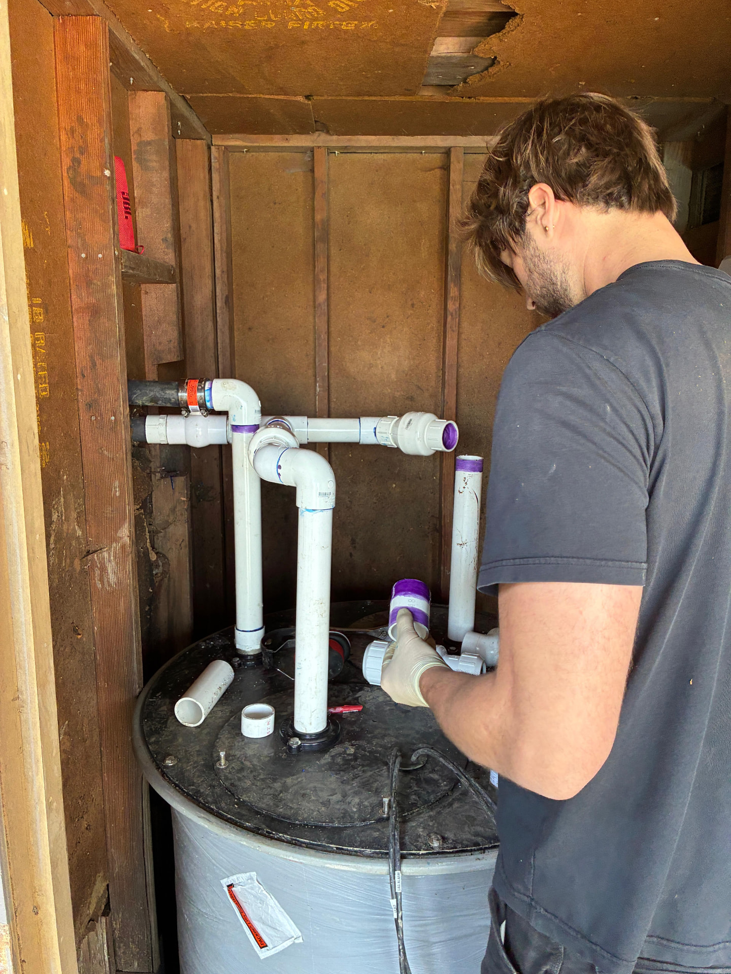 Installing sump pump piping